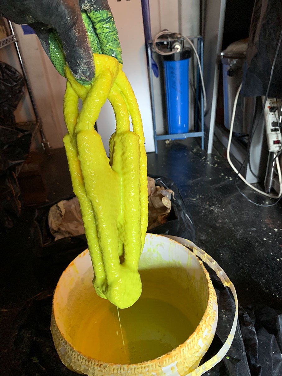 Upper arm half dipped in slurry